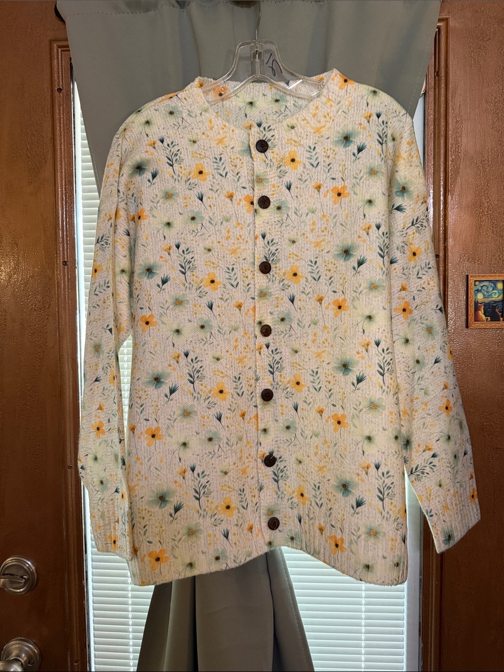 Cute little sweater size 1xl. Never worn